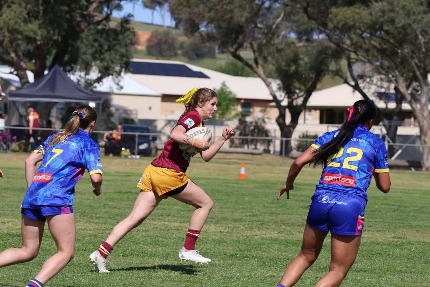 Woodbridge\\'s Caitlin Dixon runs the ball up the field. IMAGE by Alfarr Photos