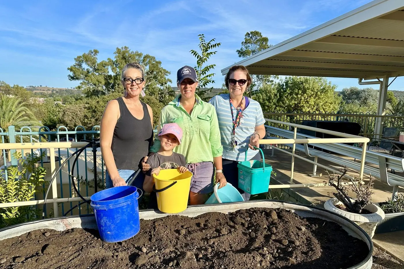 Cailin, Willa, Allie and Loyola rallied to help construct the school\\'s new vegetable gardens. PHIOTOS: Supplied