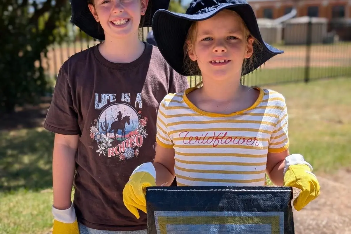 Heidi and Alexandra were happy to help tidy up the school and surrounds  to help create a cleaner, greener Australia. PHOTOS: Supplied
