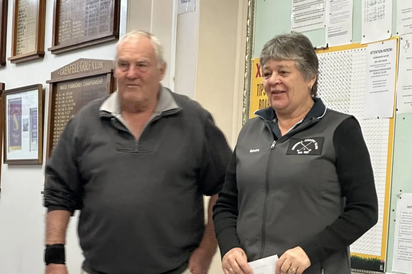 Sandra Matthews congratulated by Steve Grace for winning the Steve Mitton Memorial Day. Image supplied.