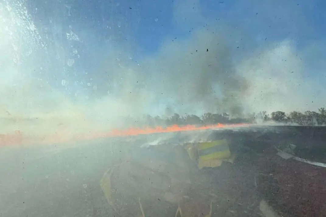 A large running grass fire ignited in Renshaw McGirr Way on Sunday that required the attention of eight fire tankers. PHOTOS: Parkes Headquarters Rural Fire Brigade