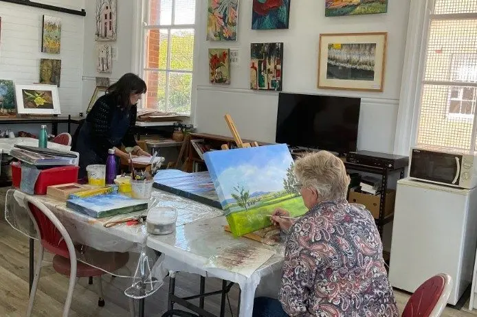 Artists in Grenfell working hard on their pieces.