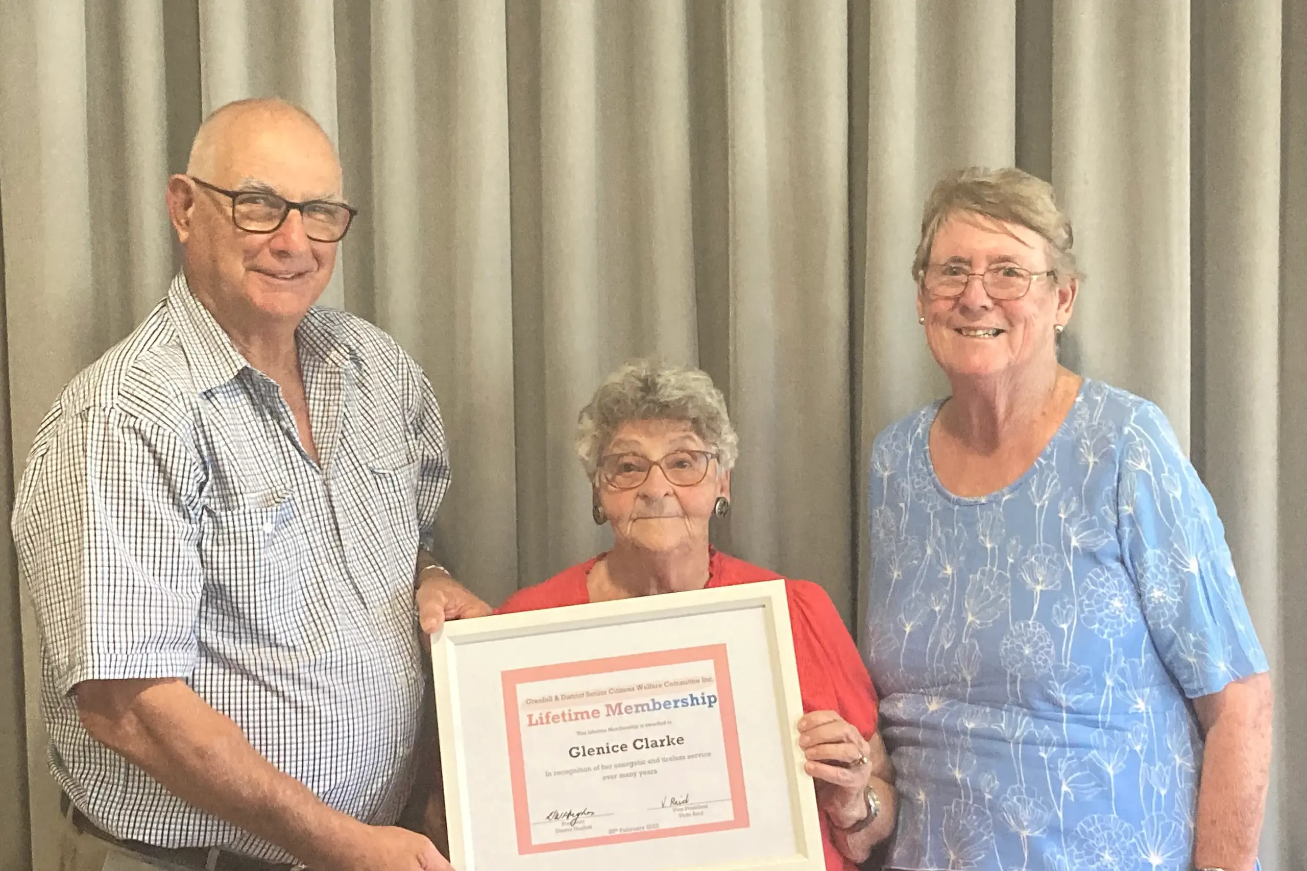 <p>Dennis Hughes and Vicki Reid awarding Glenice Clarke a life membership within the Grenfell and District Senior Citizens Committee in 2023.</p>\\n