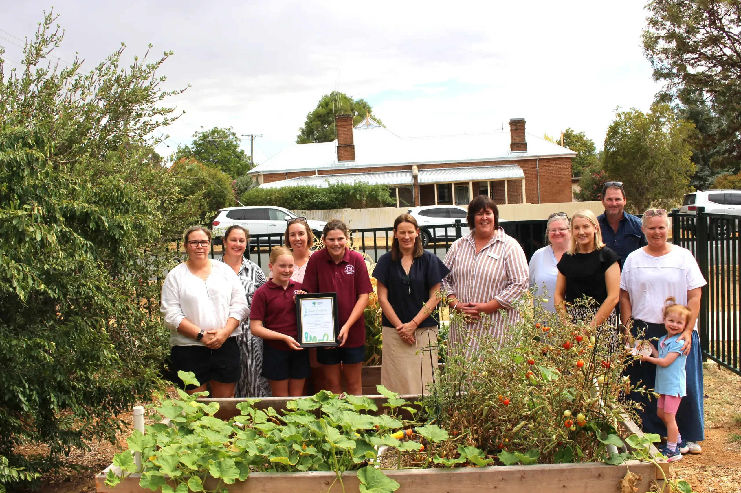 <p>Students, staff, family and community members were congratulated by  the Council of Catholic School Parents on the success of their Community Produce initiative</p>\\n