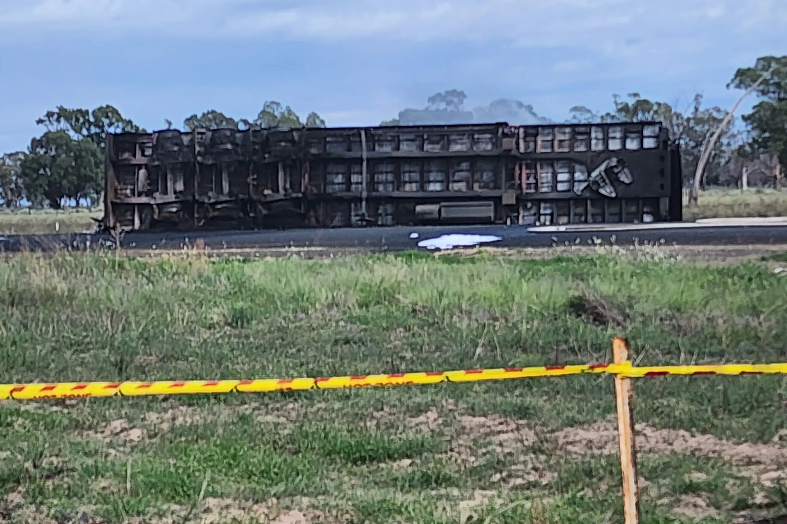 <p>Central West Police District located a B-double truck which had overturned and caught fire. PHOTOS: Supplied</p>\\n