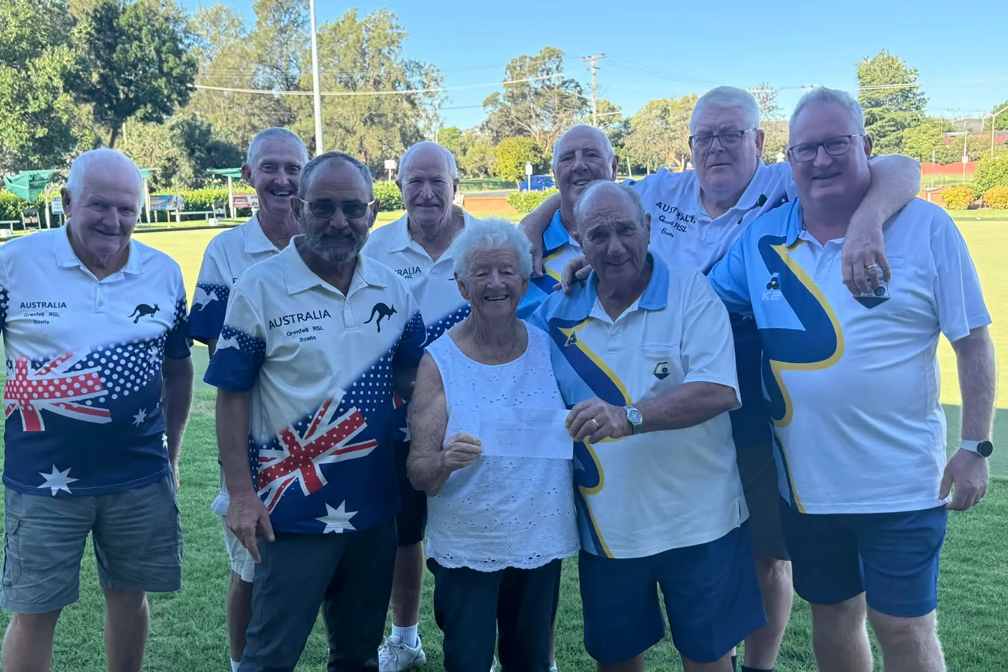 <p>Picnic Point Social Bowling Club member Arthur Gates presents a cheque for $1365 to CWA Evening Branch member Deidre Carroll. Also pictured are local bowlers and Picnic Point \\u00A0members Dave Mizon and Albert Ham. </p>\\n
