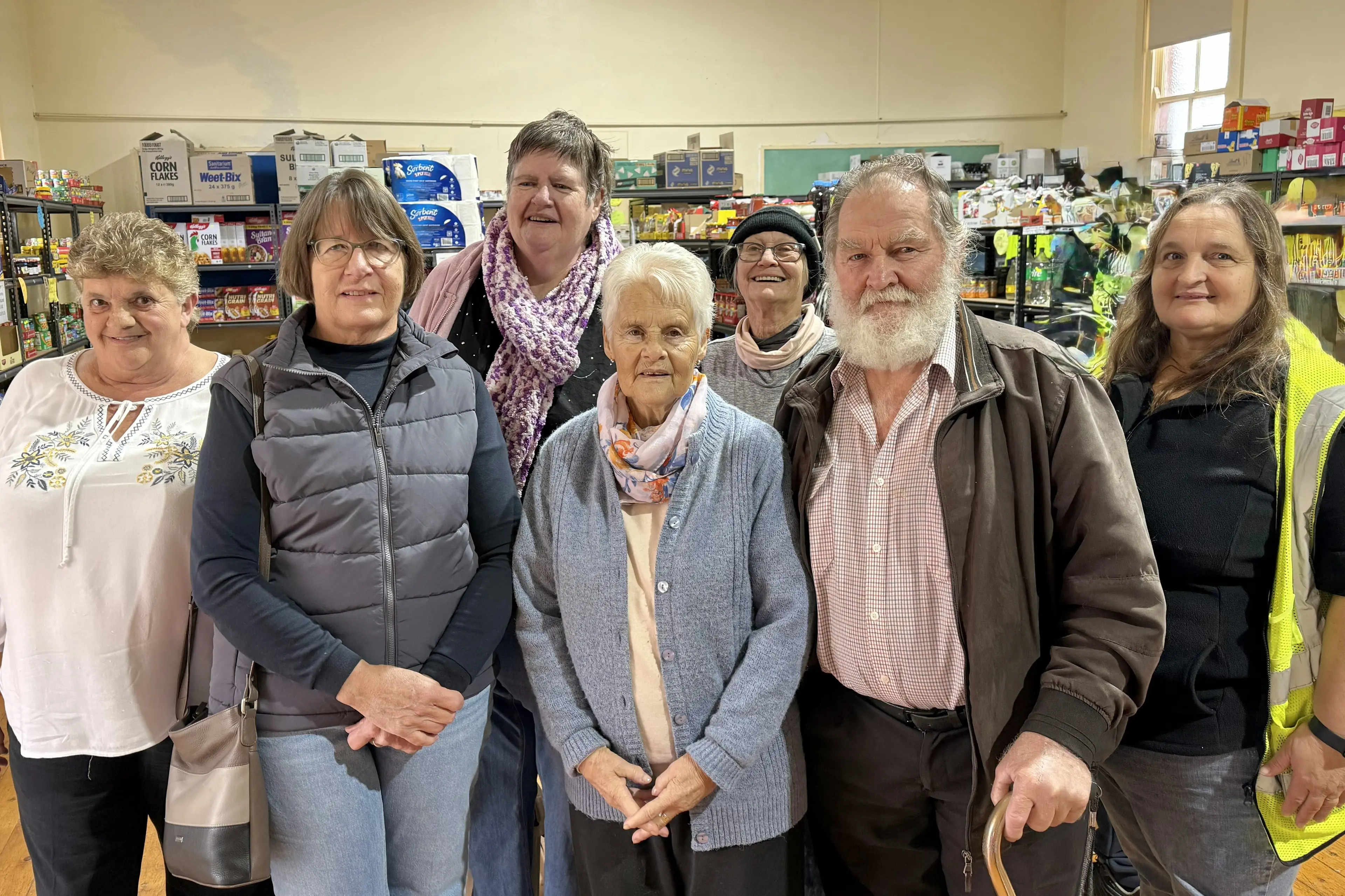 <p>Gina Chalker, Michele Johnson, Cathy Lee, Joan Cations, Annie Colbran, Phillip Cations and Joelee Knight. All the volunteers started with the Food Hall in 2016 and still going strong 10 years later. PHOTO: Colleen Gorman</p>\\n