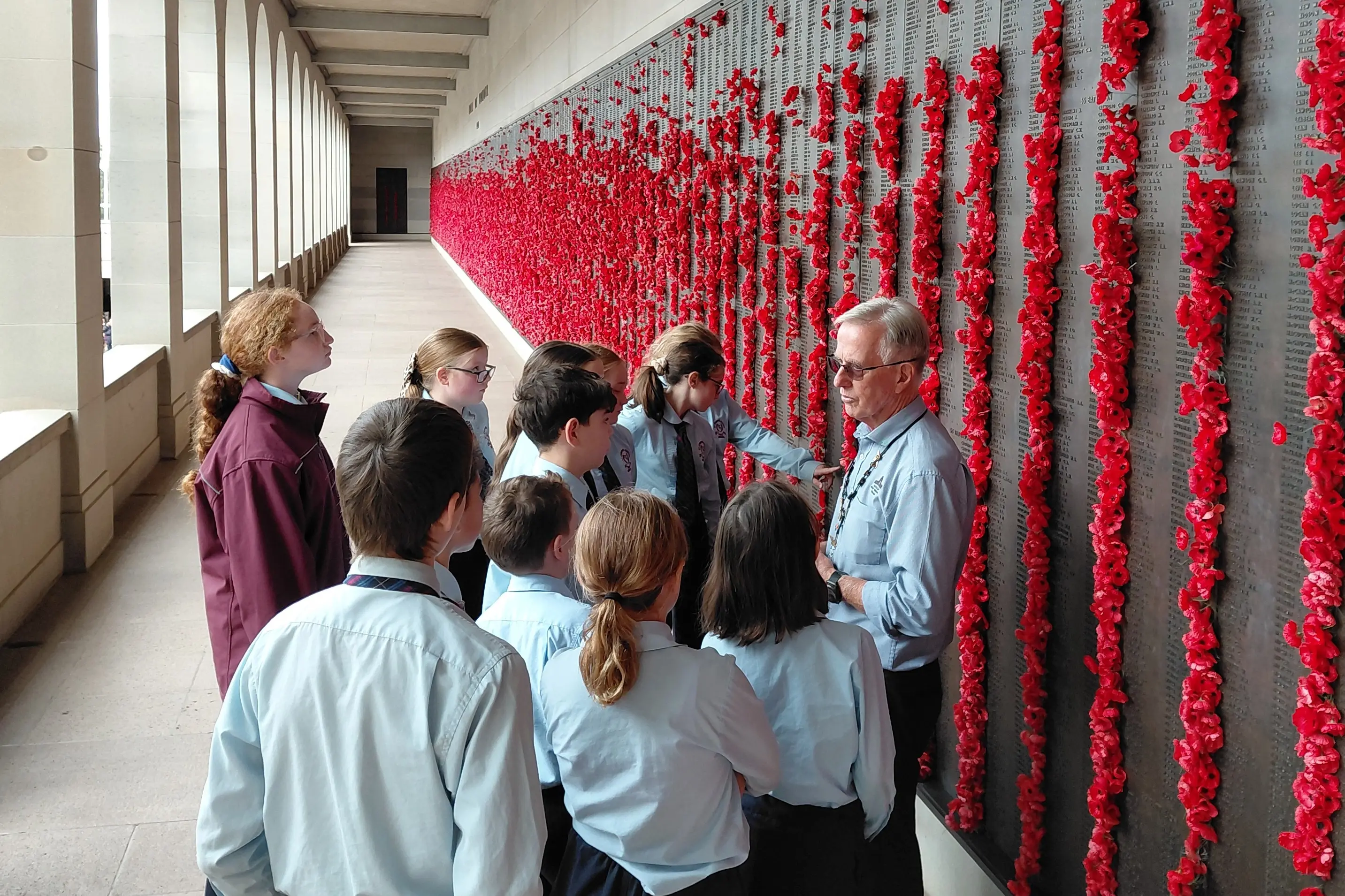 <p>Students at the Roll of Honour.</p>\\n