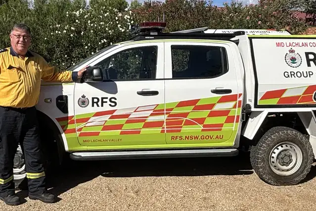 <p>Group Captain Jeff House checking out the new group officer vehicle that\\'s purpose-built and fitted with advanced communications systems and operational technology.</p>\\n