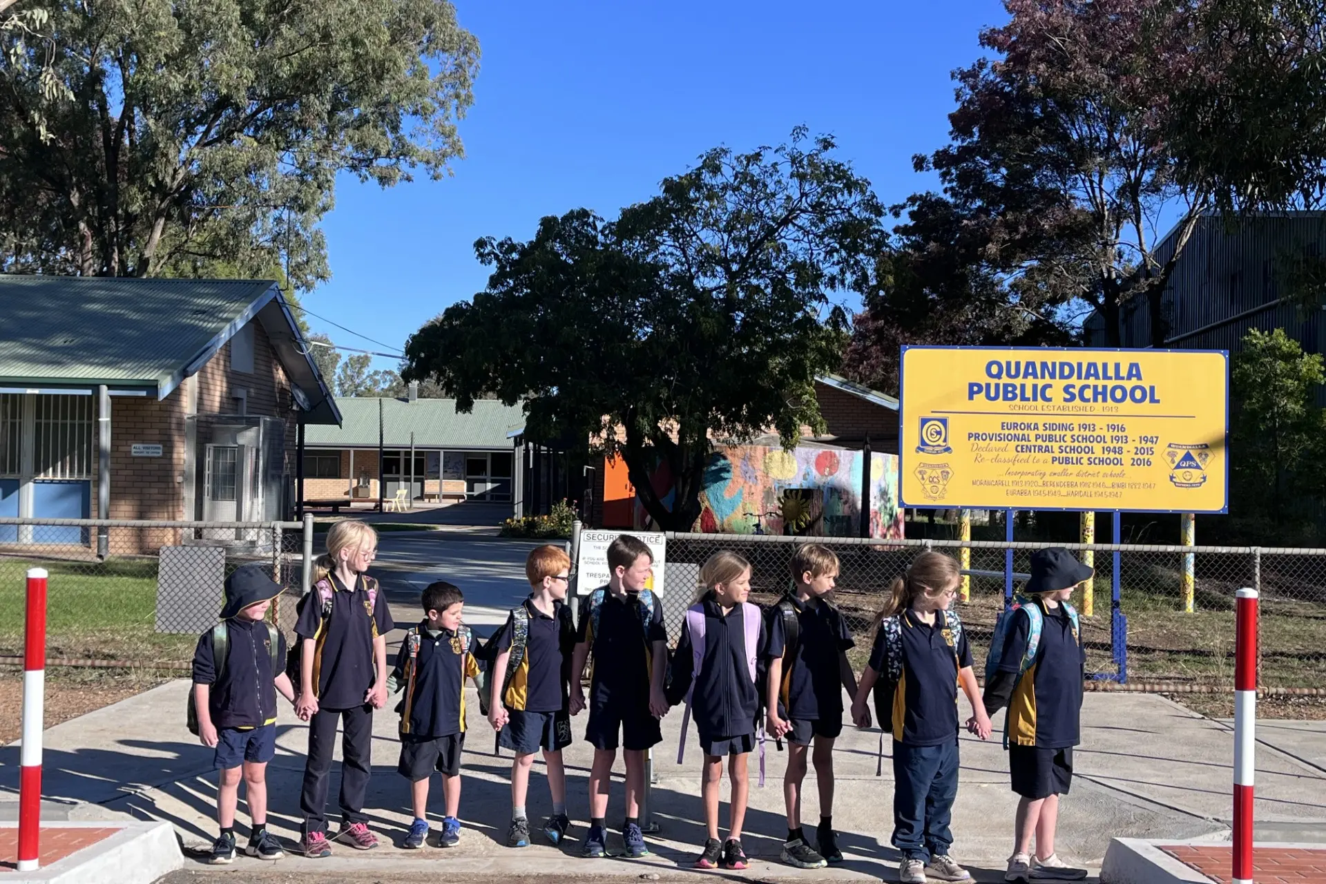 <p>Quandialla Public School\\'s winning photo of Jackson, Amber, Brailyn, Oliver, Cooper, Mindi-Lee, Madden, Amelia and Rilee being safe and looking before they cross the road. </p>\\n