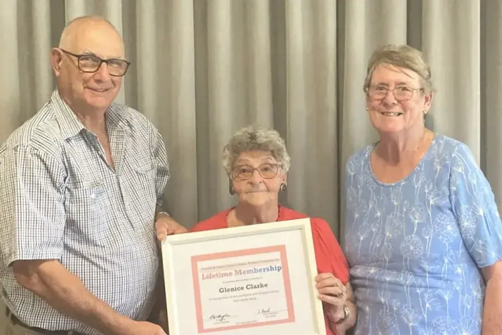 <p>Dennis Hughes and Vicki Reid awarding Glenice Clarke a life membership within the Grenfell and District Senior Citizens Committee in 2023.</p>\\n