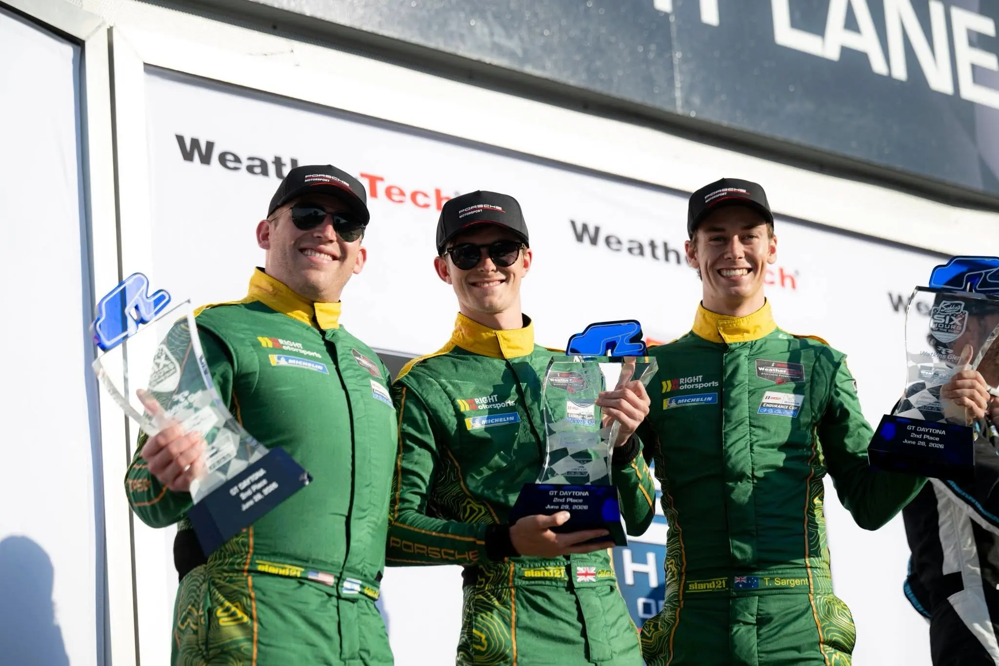 <p>Adam Adelson, Callum Ilott and Tom Sargent with their Watkins Glen 6 Hour second place trophies. PHOTO: Tom Sargent Facebook page</p>\\n