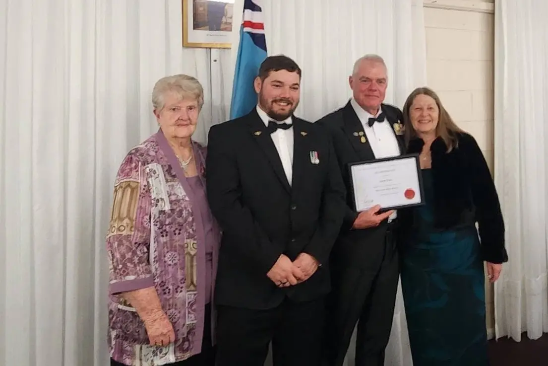 <p>Margaret Knight, Cameron McKellar and Tracie Ivins with Grenfell RSL Sub-Branch president Glen Ivins who was presented Life Membership of the Returned and Services League of Australia.</p>\\n