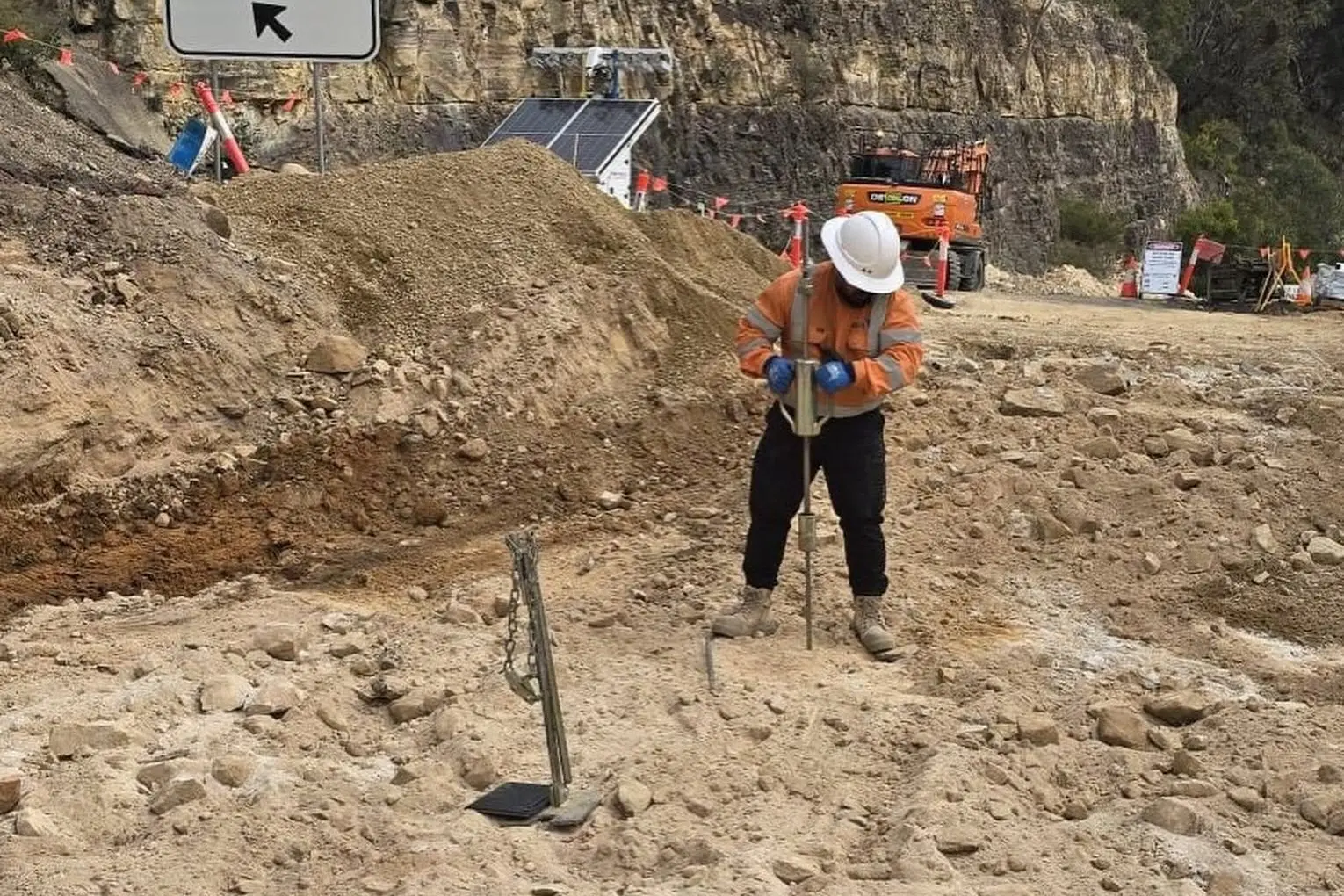 <p>Contractors are working to remove up to two metres in depth of the existing asphalt surface at Mitchells Pass. PHOTOS: Transport Minister Jenny Aitchison, facebook</p>\\n