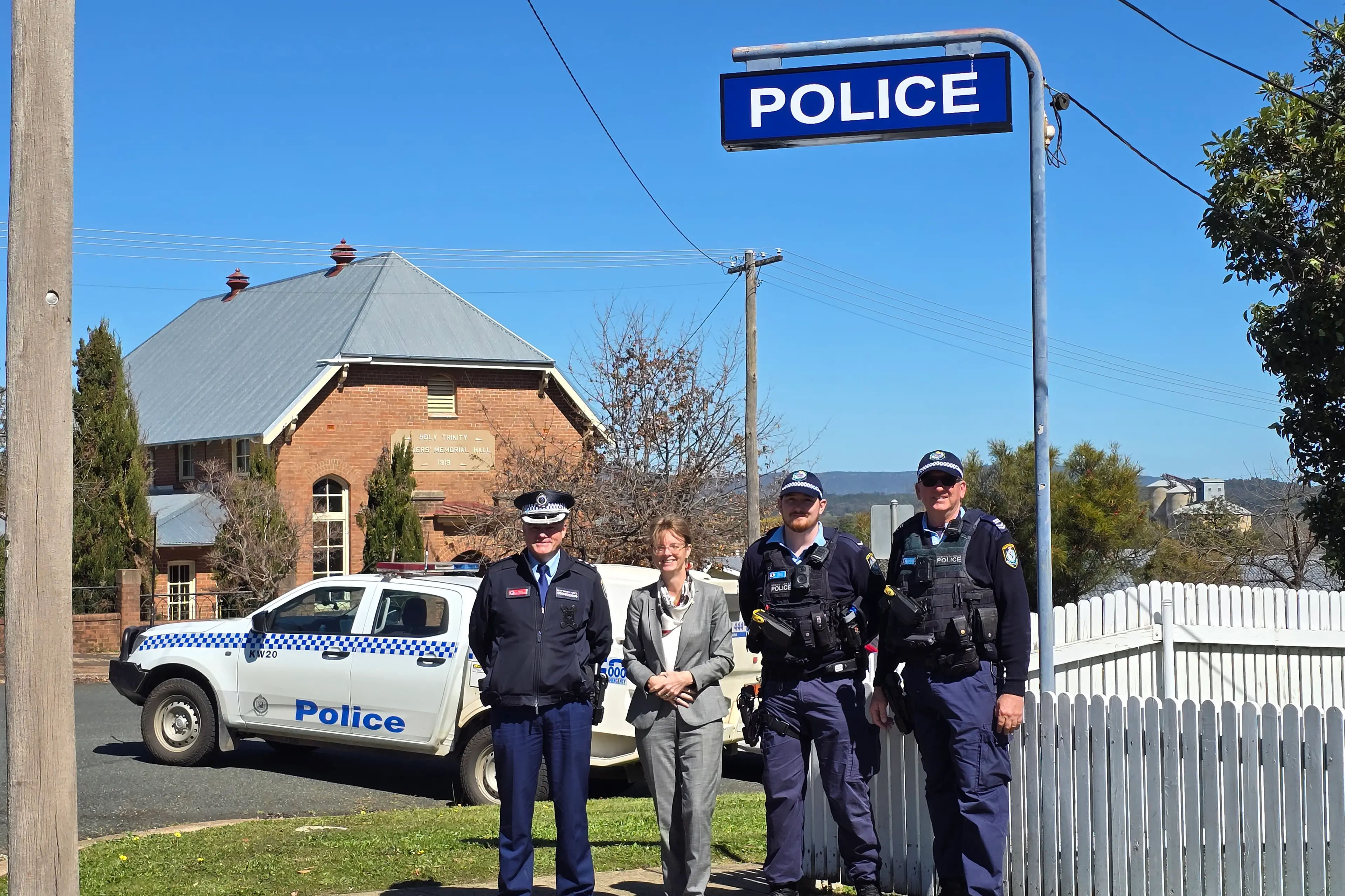 <p>Inspector Ben Granger, Steph Cooke MP, Constable Adrian Baker and Senior Constable Wayne Hadfield outside the Grenfell Police Station. </p>\\n