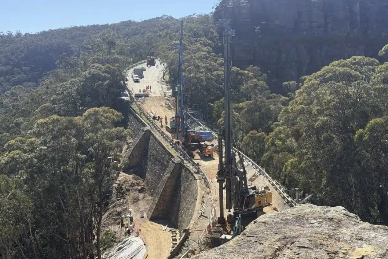 <p>A second contractor has been brought in to speed up repairs as piling for a new bridge into the historic road at Mitchell\\'s Pass continues. PHOTO: Transport for NSW</p>\\n
